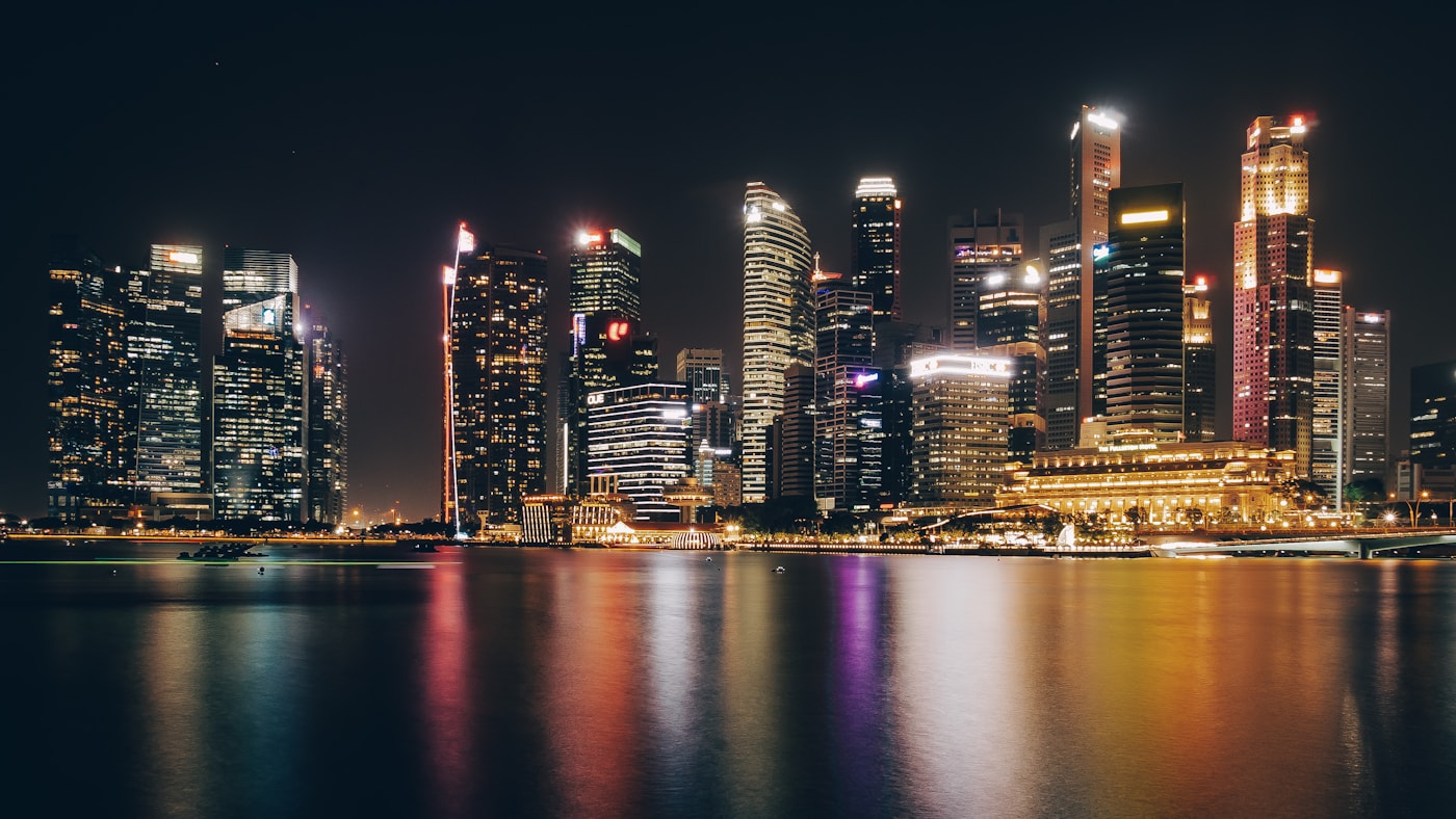 Singapore business district skyline illuminated at night
